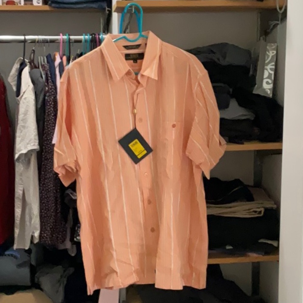 Nice button down for summers and vacations. It is size XL and new from RMG.